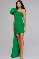 Model wearing 39983 emerald green dress with one-shoulder ruffle and side train front view