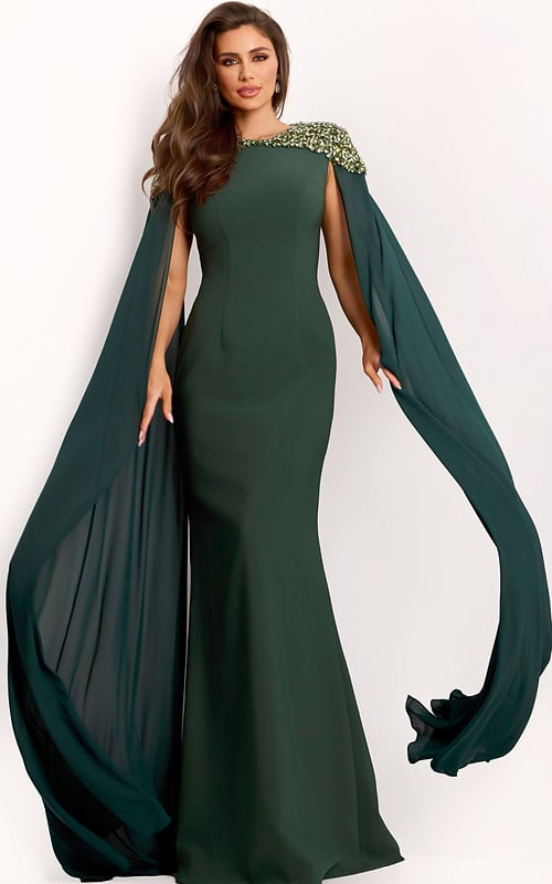 Hunter green gown with crystal shoulder detailing and chiffon cape