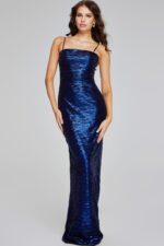 model in Jovani 40137 long navy dress with textured fabric design