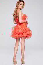 Model wearing Jovani 40144 orange dress in a front view