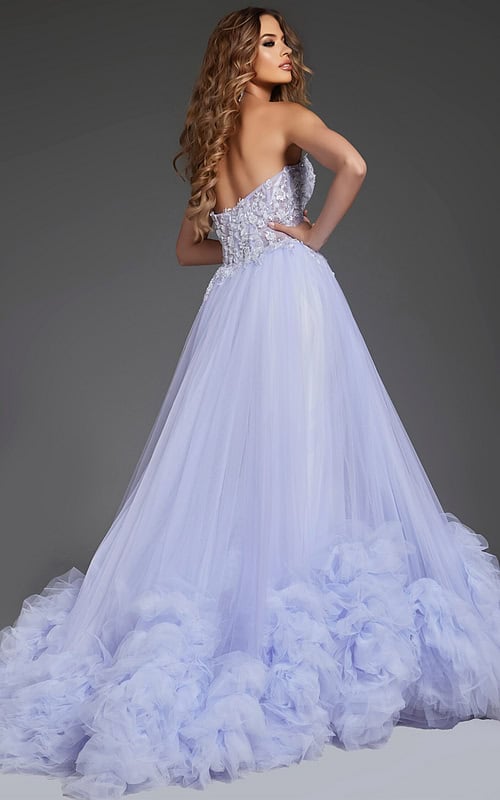 Model wearing Jovani 40170 blue ballgown from the back, showcasing elegant tulle layers.
