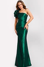 Woman wearing hunter green one-shoulder gown with floral detail