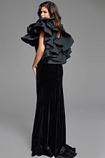 Designer velvet dress with striking shoulder ruffles and a classic silhouette