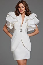 Model wearing Jovani 40292 ivory dress with ruffled sleeves, full length front view.