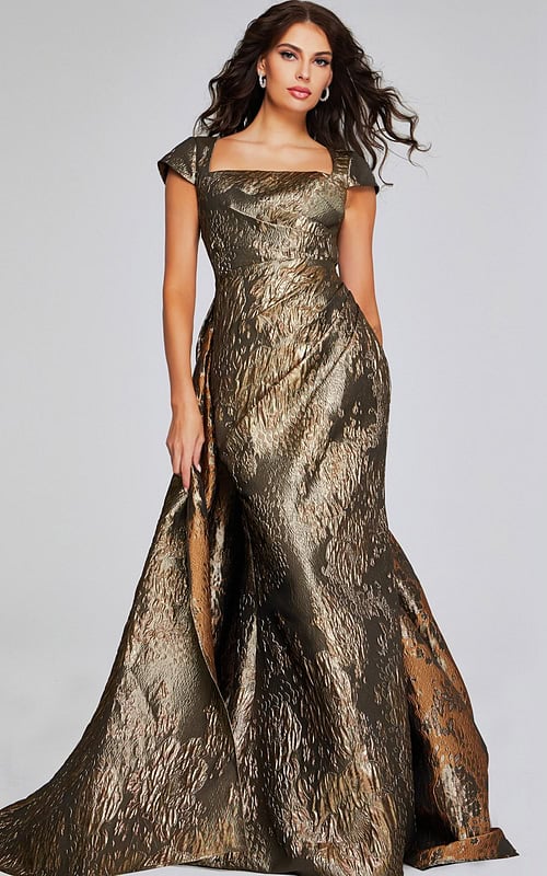 Model wearing Jovani 40295 in metallic green with square neckline and cap sleeves, A-line silhouette, front view.