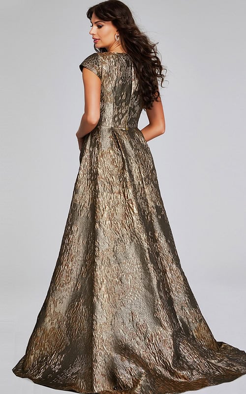 Model wearing Jovani 40295 in metallic green, back view showing A-line silhouette and cap sleeves.