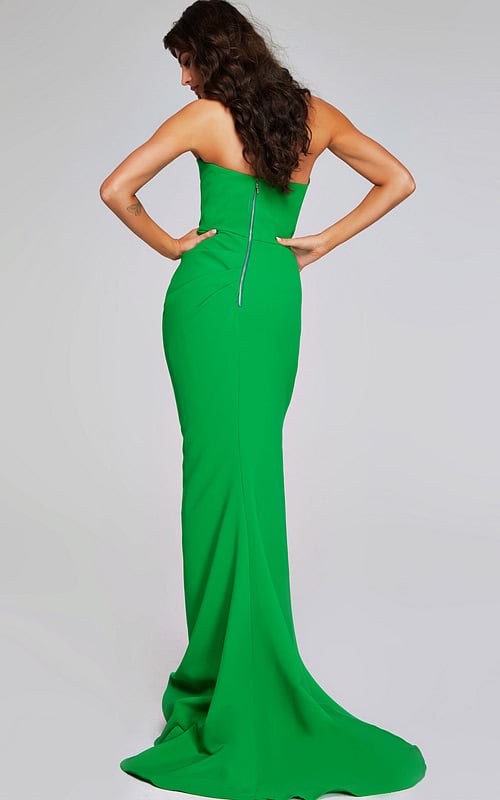 Model wearing Jovani 40301 green gown showing the back view.