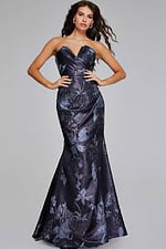 Model wearing Jovani 40309 gown with emphasis on structured bodice and floral accents from front view.