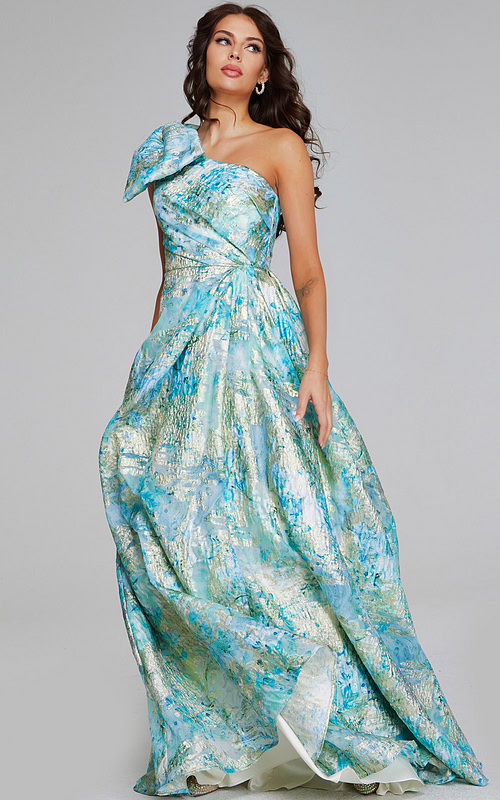 Model wearing Jovani 40317 mint multi dress with one-shoulder neckline and bow detail.