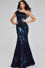 Model displaying Jovani 40320 navy gown, showcasing elegant silhouette and one-shoulder design.