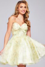Model wearing Jovani 40374 yellow knee-length dress with sweetheart neckline from the front.
