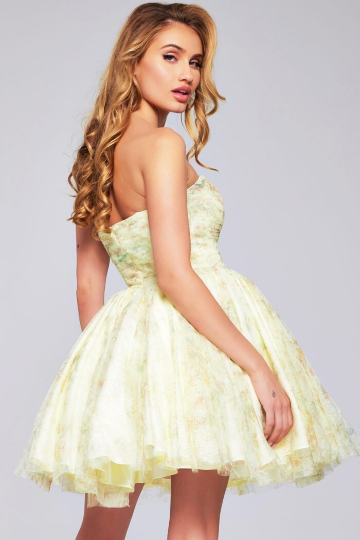 Model displaying side back angle of Jovani 40374 yellow dress.