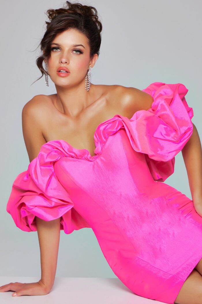 model wearing Jovani 40378 pink dress with off-the-shoulder ruffled sleeves, back view