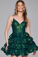 Model wearing Jovani 40382 green mini dress with a sweetheart neckline and ruffled skirt.