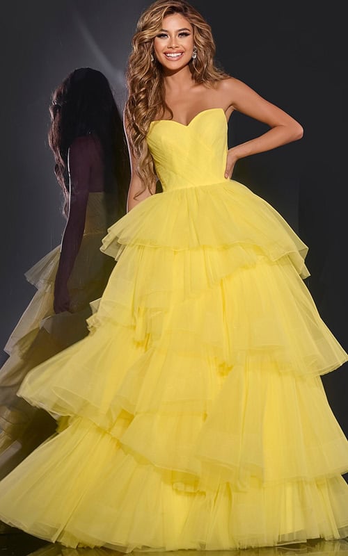 Model wearing Jovani 40394 yellow ball gown with sweetheart neckline.