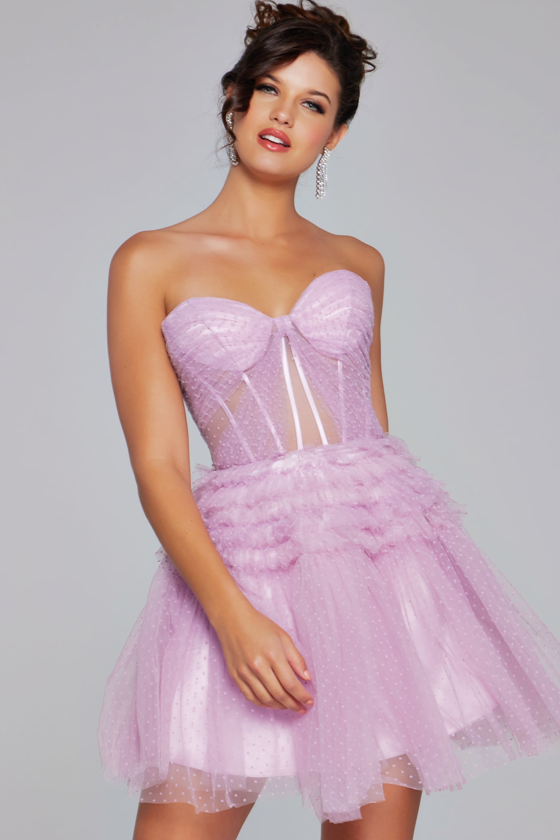 40467-.jpg Model wearing Jovani 40467 lilac dress with sweetheart neckline and sheer paneling, front view