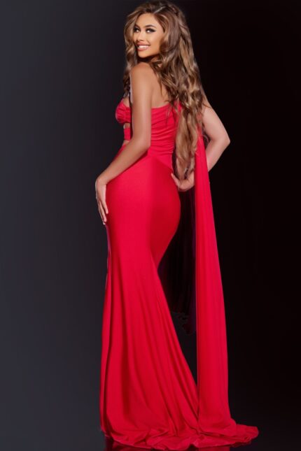 Back view of model in Jovani 40475 red one-shoulder dress showcasing elegant silhouette.