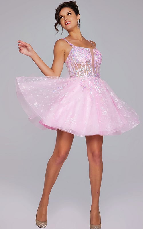 Model wearing Jovani 40501 pink A-line dress with floral details and tulle skirt, front view.