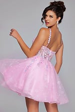 Model in pink Jovani 40501 dress with charming floral back details, shown from the back.