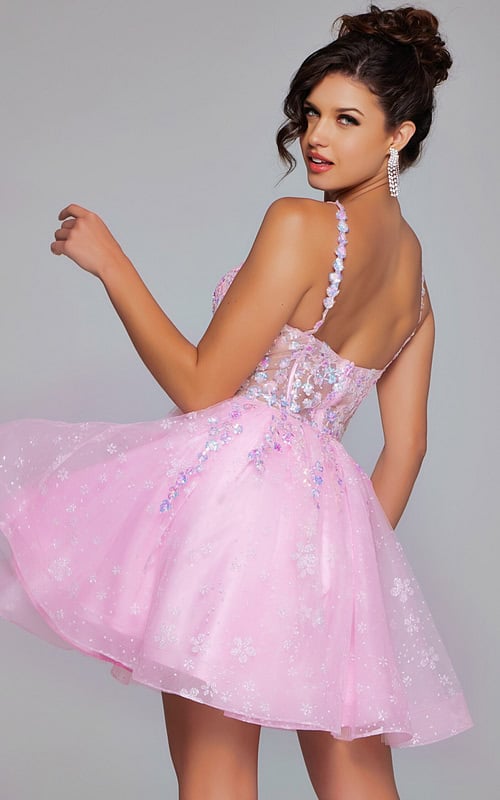 Model in pink Jovani 40501 dress with charming floral back details, shown from the back.