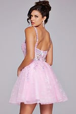 Model wearing Jovani 40501 pink dress highlighting the back design with floral embellishments.