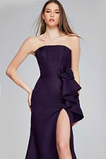 Model wearing Jovani 40592 purple dress with high slit, front view
