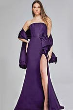 Model wearing Jovani 40592 purple gown with floral accent and high slit, front view