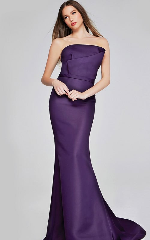model wearing Jovani 40598 purple mermaid gown with strapless neckline