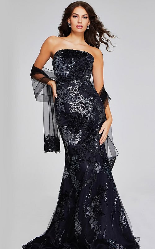 Model wearing Jovani 40604 black dress with floral embroidery and strapless neckline, front view.