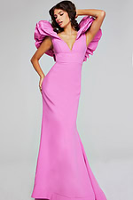 Model wearing Jovani 40663 pink mermaid dress posed elegantly