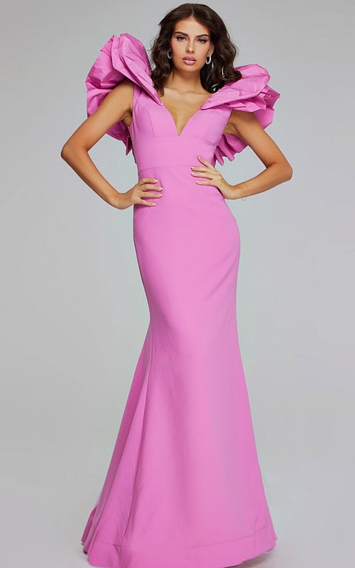 Model wearing Jovani 40663 pink mermaid dress with V-neckline and ruffled sleeves, front view
