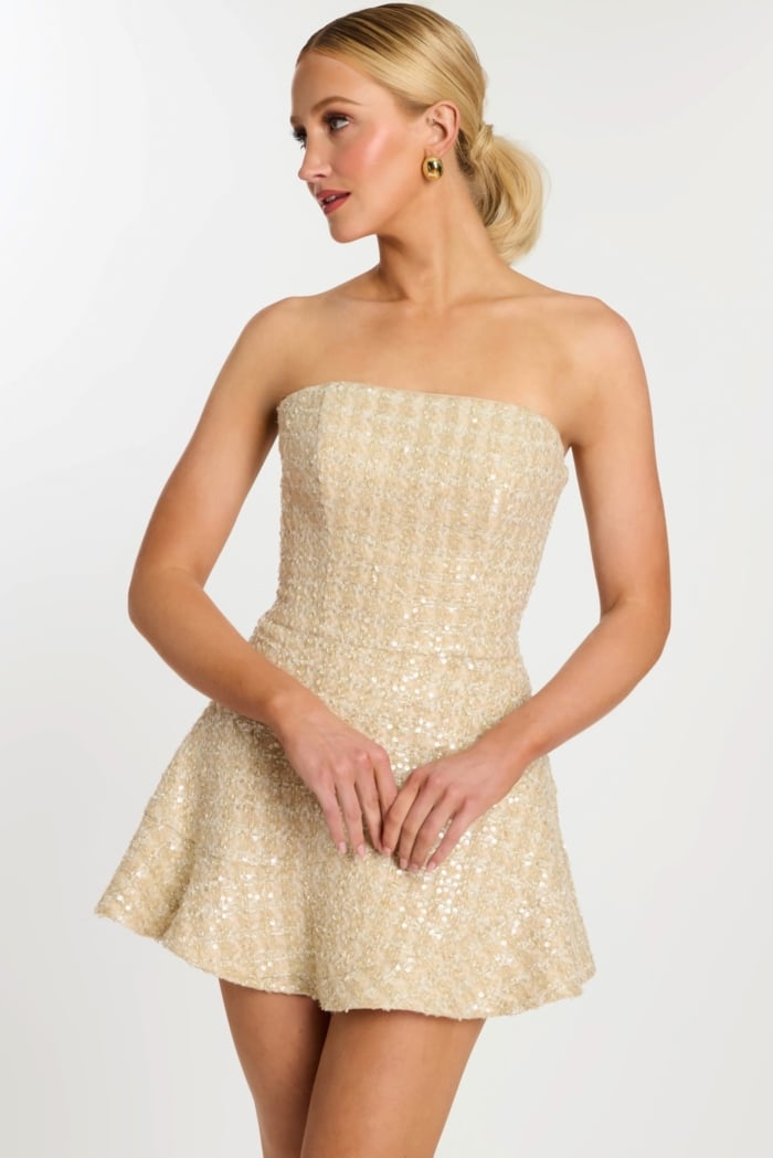 Front view of strapless champagne short dress with glitter tweed and flared skirt