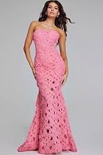 Model wearing Jovani 40744 pink gown with floral appliques, front view.