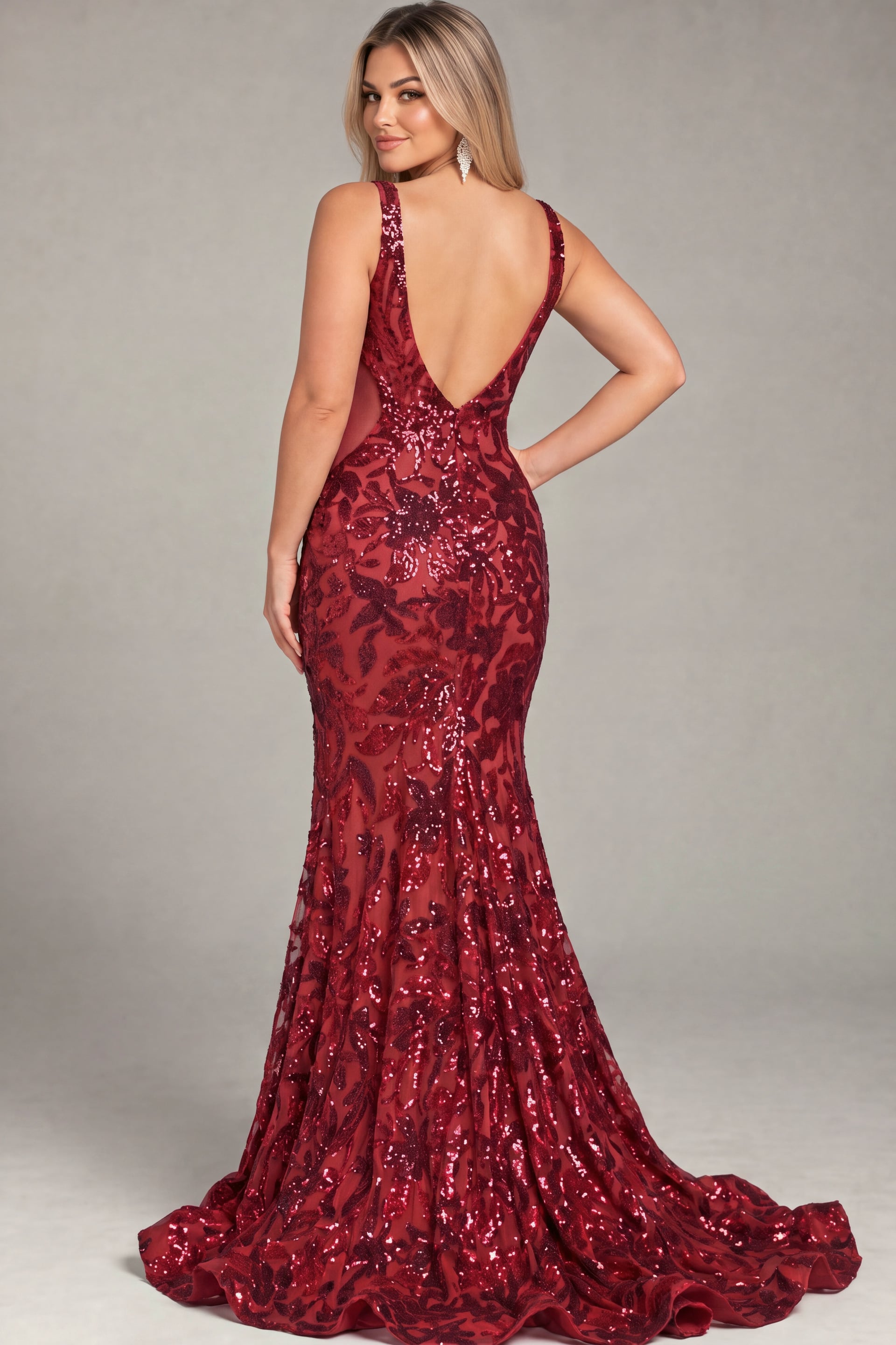 Back view of burgundy sequin floral gown showing the open back, plus size, Jovani style 40755