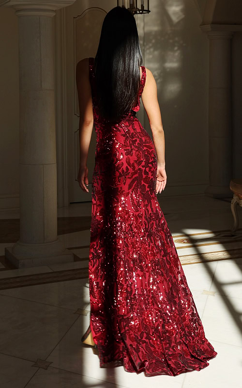 Deep V-neck sequin gown with floral beading and high slit