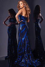 Back view of model in Jovani 40765 navy blue gown.