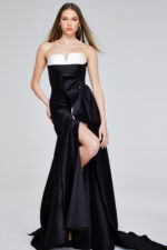 Model wearing Jovani 40792 black strapless gown front view.