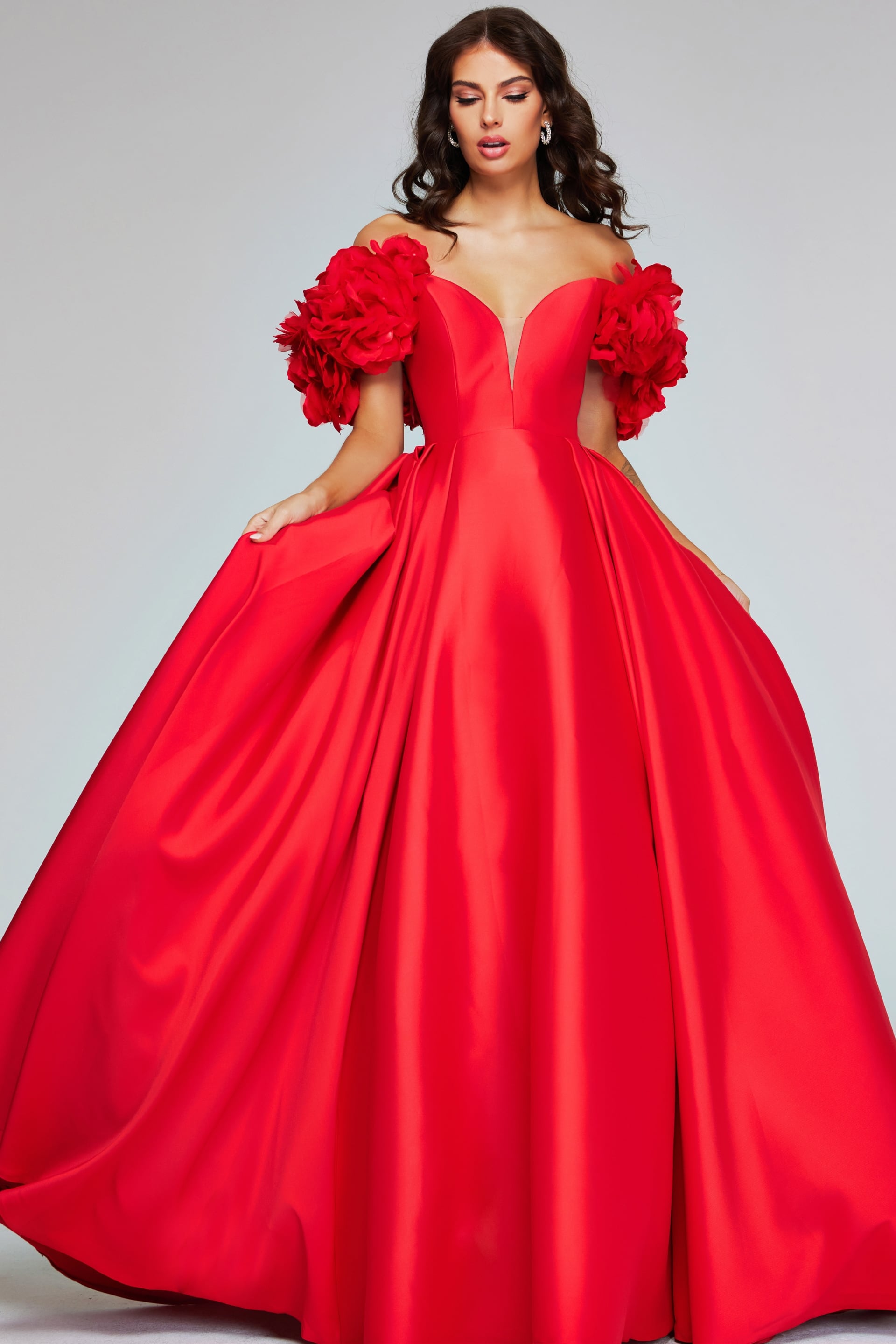 40794-RED-2012.jpg Model wearing Jovani 40794 front view of the red ball gown with floral details