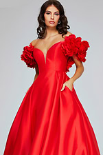 Model wearing Jovani 40794 close up of the red ball gown with floral shoulders