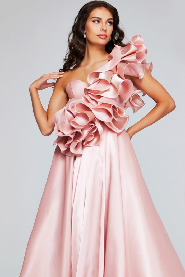 Model wearing Jovani 40796 blush dress with ruffled floral detail, alternative angle.