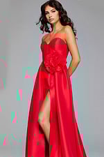 Model wearing Jovani 40826 red gown angled view showing floral applique and slit