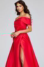 Model wearing Jovani 40832 red gown in front view with a high slit and floral detail