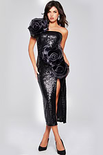 Model posing in Jovani 40842 black sequin dress with floral details and slit, front view.