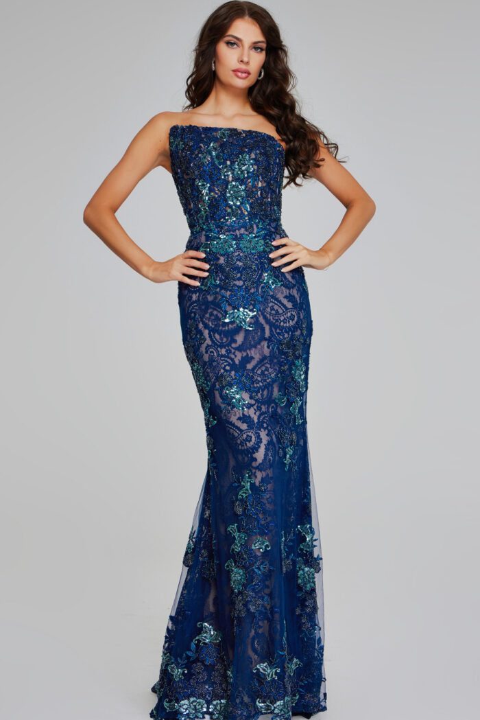 Model wearing Jovani 40847 navy strapless mermaid silhouette dress with lace and sequins, front pose.