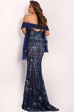 Back view of navy lace gown with sheer embroidered details