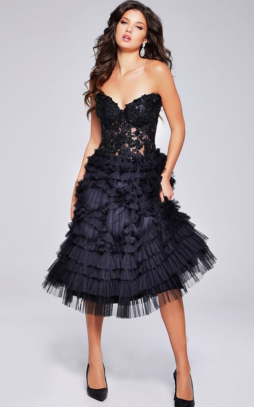 Model wearing Jovani 40854 black cocktail dress with sweetheart neckline and tiered tulle skirt, front view.