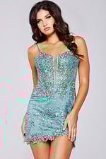 Model wearing Jovani 40922 green dress with sequin details and sweetheart neckline.