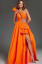 Model in Jovani 40929 orange gown with detailed embellished bodice and high slit