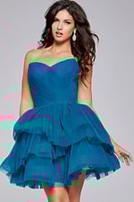 Model in Jovani 41054 blue dress, front view highlighting A-line silhouette.