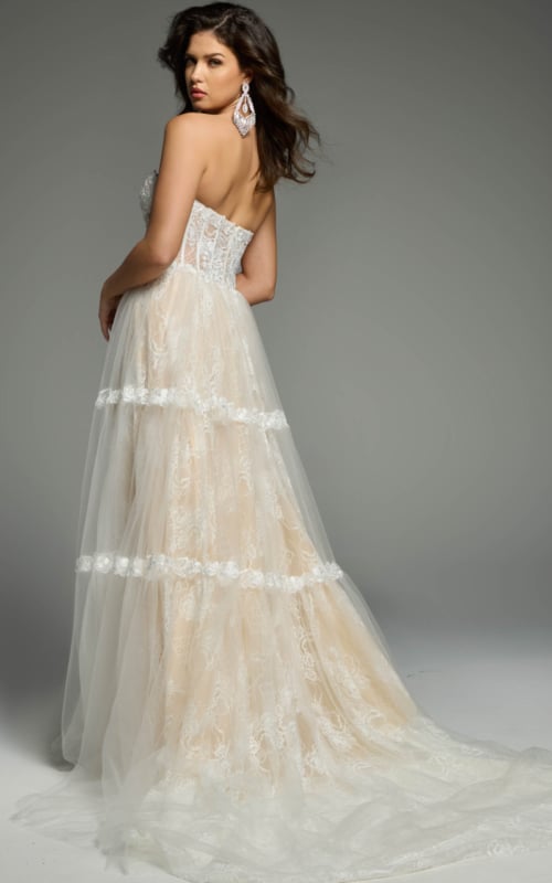 Back View Of Tiered Tulle Bridal Gown With Sheer Corset Bodice
